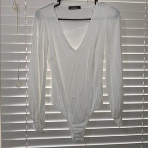 White/cream long sleeve bodysuit